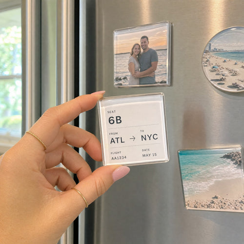 Boarding pass turned into a clear magnet on the fridge